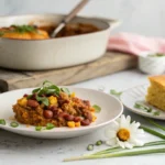 Cowboy casserole served on a plate with garnish
