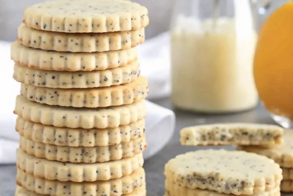 Freshly baked lemon poppy seed cookies with a sprinkle of poppy seeds