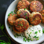 Delicious homemade 5-ingredient lentil burgers served on a wooden cutting board with fresh toppings